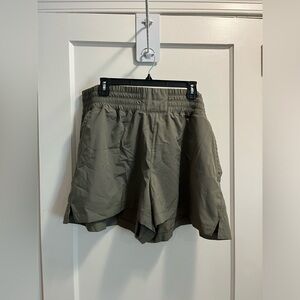 Green athletic shorts
